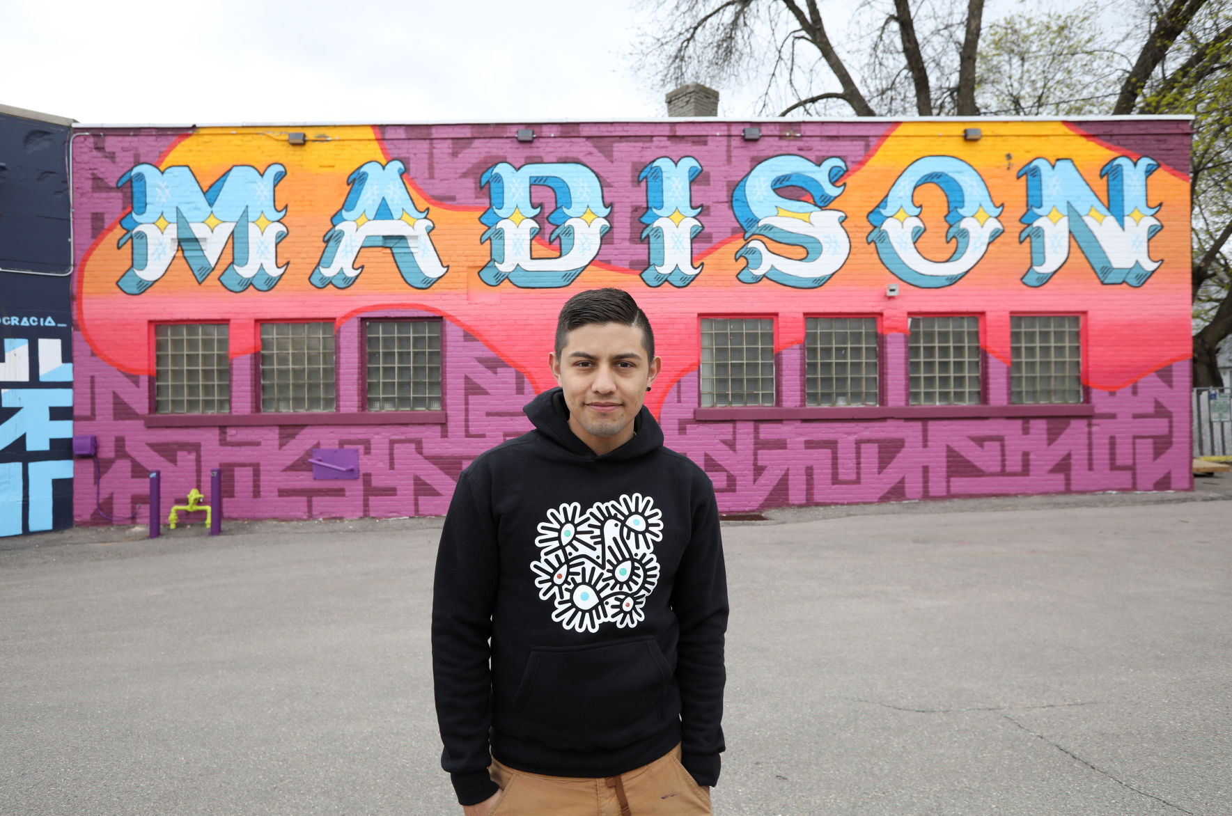 Liubov Szwako with Madison mural